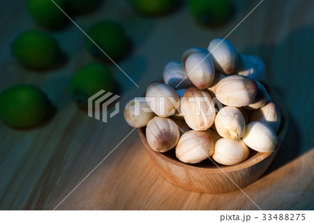 close up lotus seed on small wooden cup 33488275