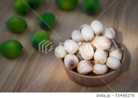 close up lotus seed on small wooden cup 33488276