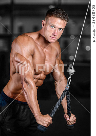 Brutal caucasian handsome fitness men on diet training triceps g Brutal caucasian handsome fitness men on diet training triceps g 33488708