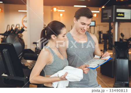 Young people training in gym body fit care 33490813