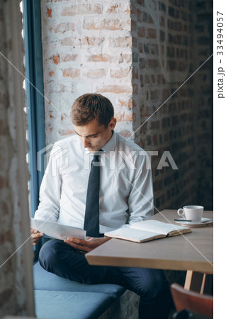 businessman in cafe businessman in cafe 33494057