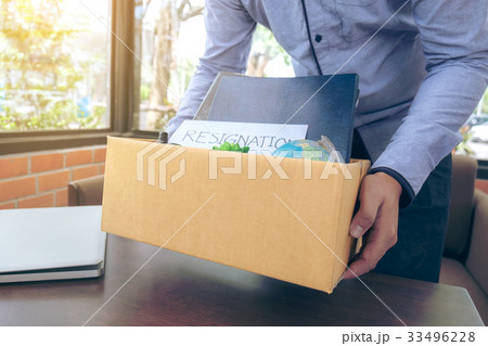 businessman carrying packing up all his personal 33496228