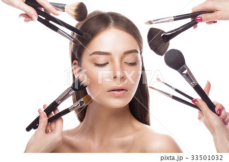 Beautiful young girl with a light natural make-up 33501032