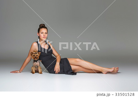 Girl with yorkie dog Girl with yorkie dog 33501528