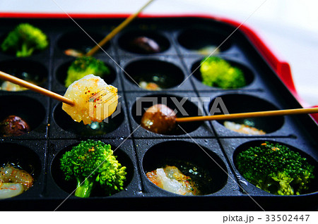 タコ焼き器でアヒージョ 33502447