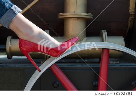 Girl in red patent leather shoes 33502891
