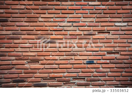 Background and texture of old vintage brick wall Background and texture of old vintage brick wall 33503652