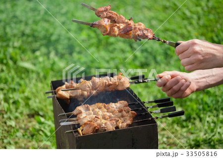Process of cookong shashlik outdoor, img 13 of 17 Process of cookong shashlik outdoor, img 13 of 17 33505816