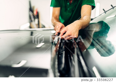 Professional worker install paint protect Professional worker install paint protect 33506227