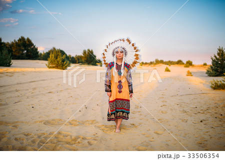 Young American Indian woman in traditional costume 33506354