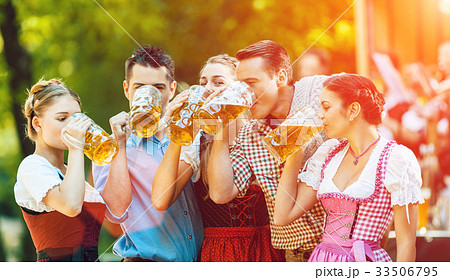 In Beer garden - friends in front of band 33506795