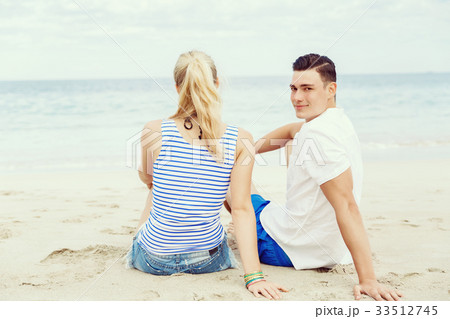 Romantic young couple on the beach Romantic young couple on the beach 33512745