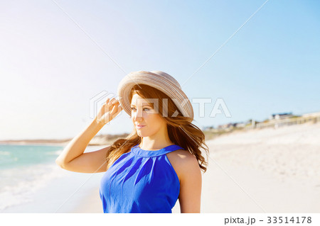 Young woman at the beach Young woman at the beach 33514178