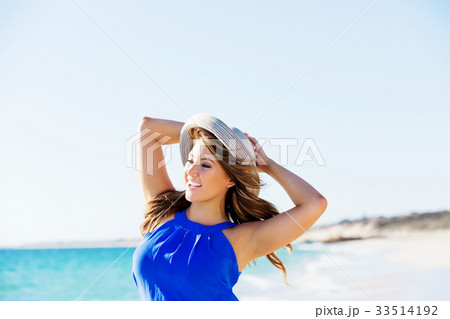 Young woman at the beach Young woman at the beach 33514192