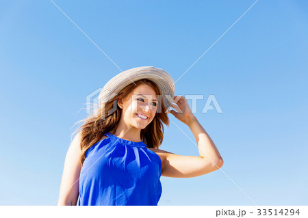 Young woman at the beach Young woman at the beach 33514294