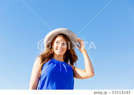 Young woman at the beach Young woman at the beach 33514295