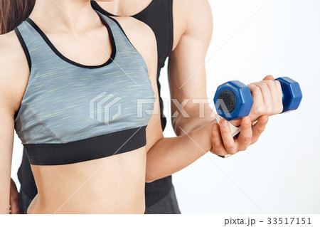 Woman training in gym body health fit care Woman training in gym body health fit care 33517151