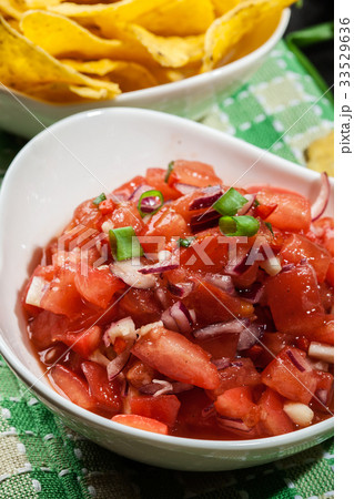 Bowl of fresh salsa with tortilla chips 33529636