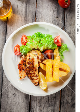 Grilled chicken breasts Grilled chicken breasts 33530579