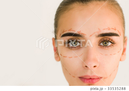Correction lines on woman face. Close up portrait. Correction lines on woman face. Close up portrait. 33535288