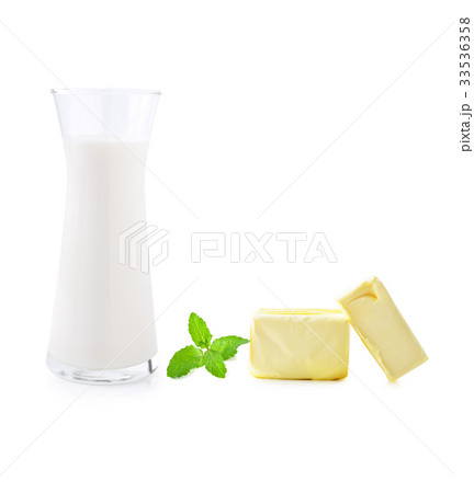 glass of milk and butter and mint leaves glass of milk and butter and mint leaves 33536358