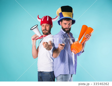 The two football fans over blue 33540262