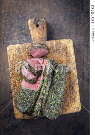 Barbecue Saddle of Venison on Cutting Board 33540432