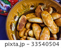 Latvian tradition baked meat pies in a large bowl 33540504