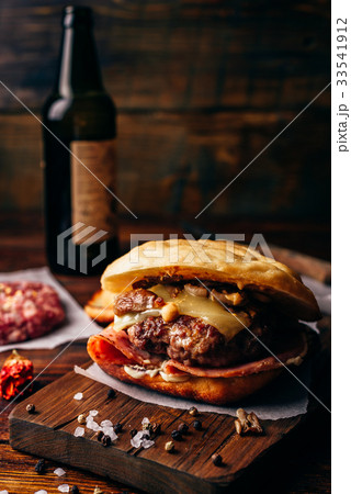 The Casanova Burger on Cutting Board. The Casanova Burger on Cutting Board. 33541912
