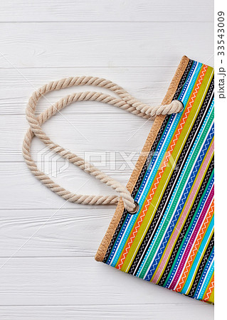 Cropped image of textile handbag. Cropped image of textile handbag. 33543009