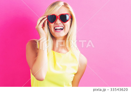 Young woman with sunglasses  33543620
