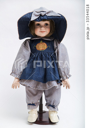 Ceramic brunette doll in big hat and blue dress Ceramic brunette doll in big hat and blue dress 33544018