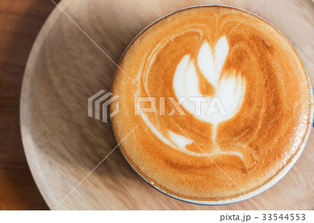 Top view of coffee cup on table. 33544553