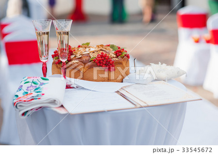 Wedding glasses filled with champagne at banquet 33545672