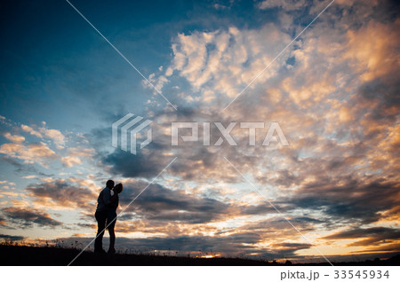 Couple lover holiday happy silhouette sky sunset Couple lover holiday happy silhouette sky sunset 33545934