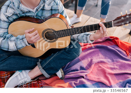 Guitarist at student party celebration Guitarist at student party celebration 33546567