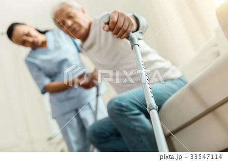 Professional walking stick being held by a nice 33547114