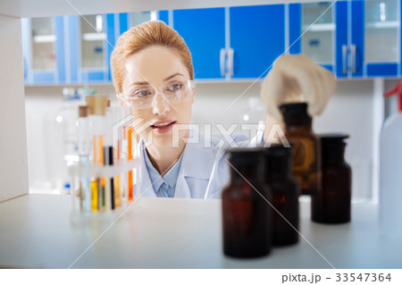 Amazing scientist enjoying her project Amazing scientist enjoying her project 33547364
