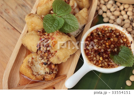 Fried tofu, chinese vegetarian food with sauce. 33554151