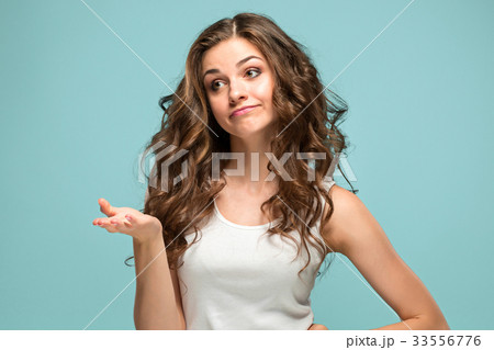 The young woman's portrait with sad emotions 33556776