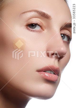 Close-up portrait of beautiful woman's purity face 33565223
