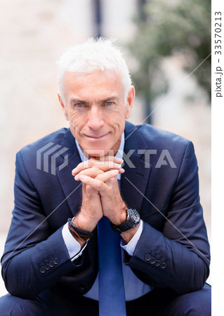 Portrait of confident businessman outdoors Portrait of confident businessman outdoors 33570213