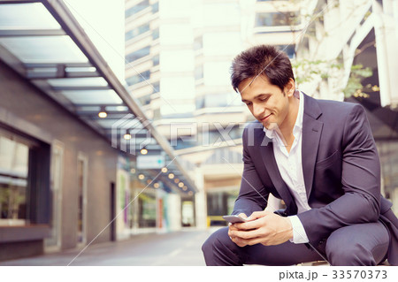 Portrait of confident businessman outdoors Portrait of confident businessman outdoors 33570373