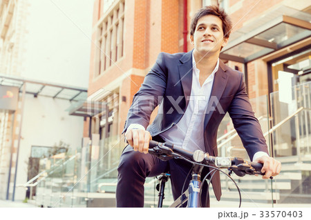 Successful businessman with bicycle 33570403