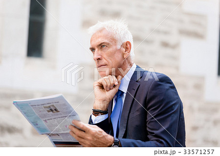 Portrait of confident businessman outdoors Portrait of confident businessman outdoors 33571257