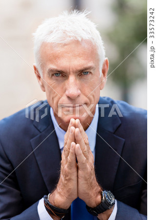 Portrait of confident businessman outdoors Portrait of confident businessman outdoors 33573242