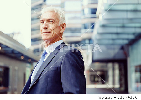Portrait of confident businessman outdoors Portrait of confident businessman outdoors 33574336