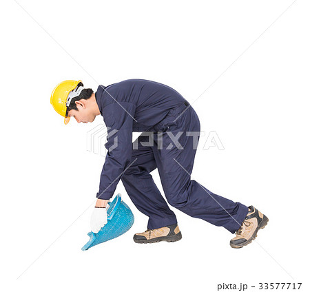 Young worker hold Hod or clam-shell shaped basket 33577717