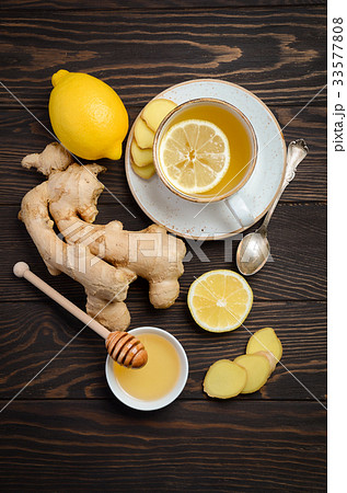Ginger root tea with lemon and honey Ginger root tea with lemon and honey 33577808