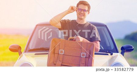 Young man with travel suitcase 33582779